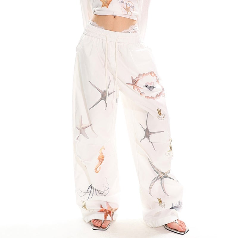 White Wide-Leg Trousers with Graphic Print and Lace Trim White Wide-Leg Trousers with Graphic Print and Lace Trim — Aesthetic White Pants Outfits