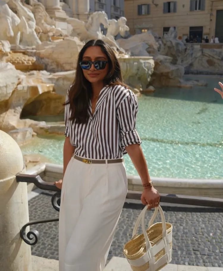 Striped Button-Up Shirt with Cream Trousers for Daytime Travel — Italy Outfits