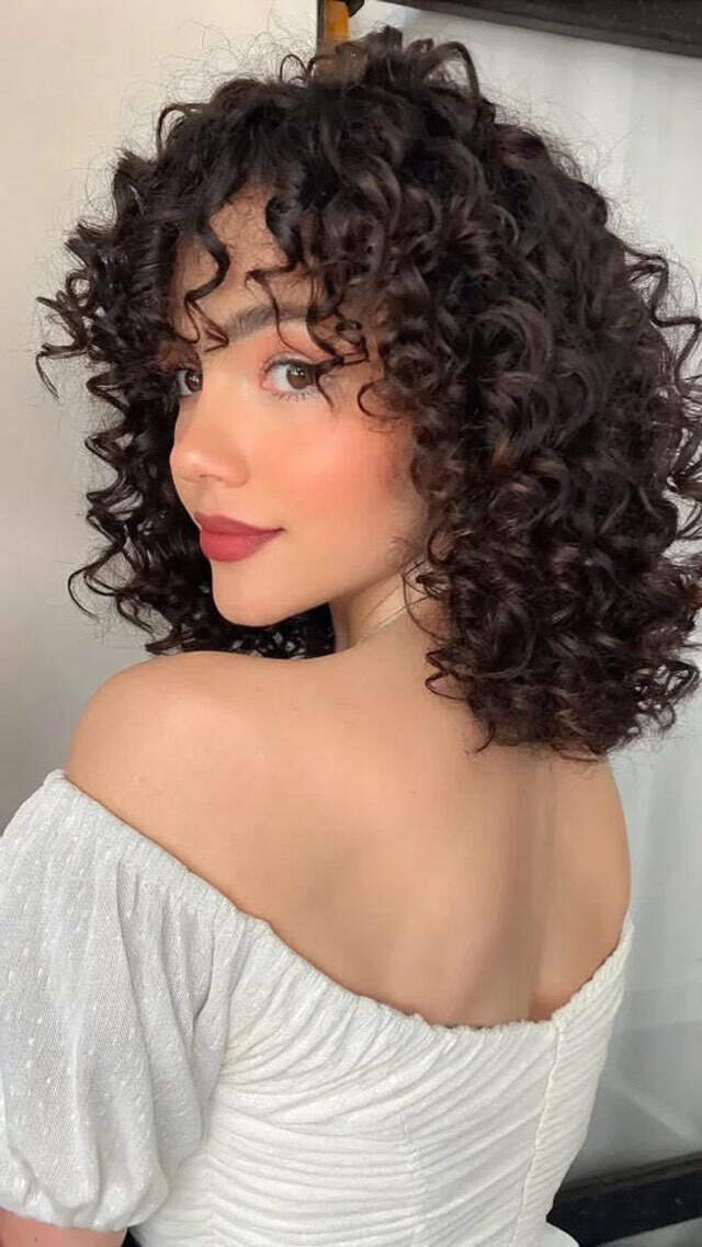 Collarbone Length Curls With Curtain Bangs and Blowout, Close-Up Take — Easy Curly Hair Routine