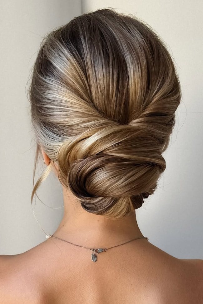 Voluminous Blonde Bun With Twisted Texture — Low Bun Wedding Hair