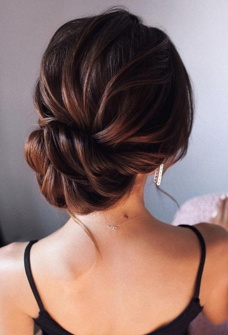 Dark Brown Twisted Low Bun With Soft Waves — Low Bun Wedding Hair