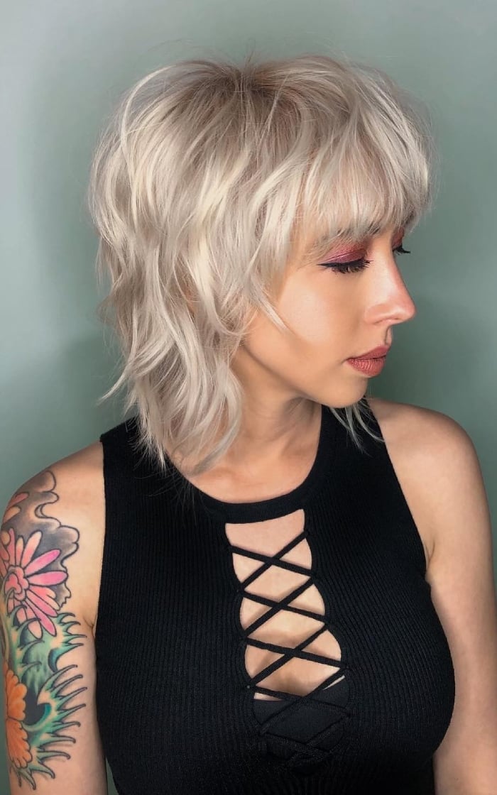 Platinum Blonde Shag With Textured Bangs Platinum Blonde Shag With Textured Bangs — Trendy Short Shag