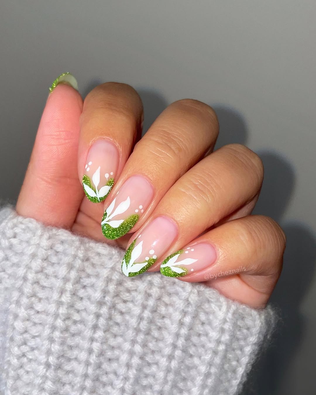 Medium Almond With Green Glitter Tips And Leaf Art — Trendy Green French Tip Nails