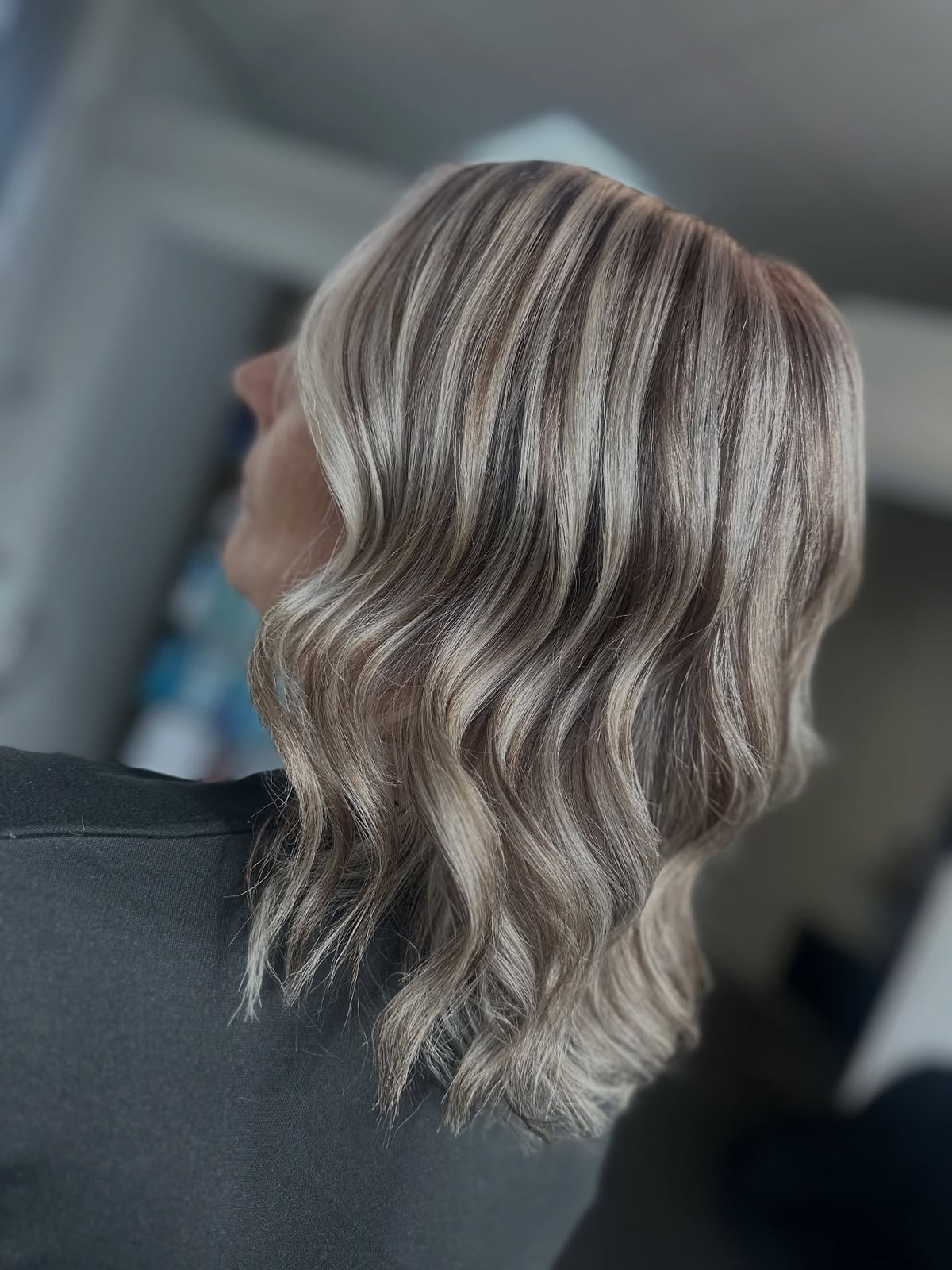 Chin Length Bob With Soft Gray Highlights — Trendy Grey Highlights