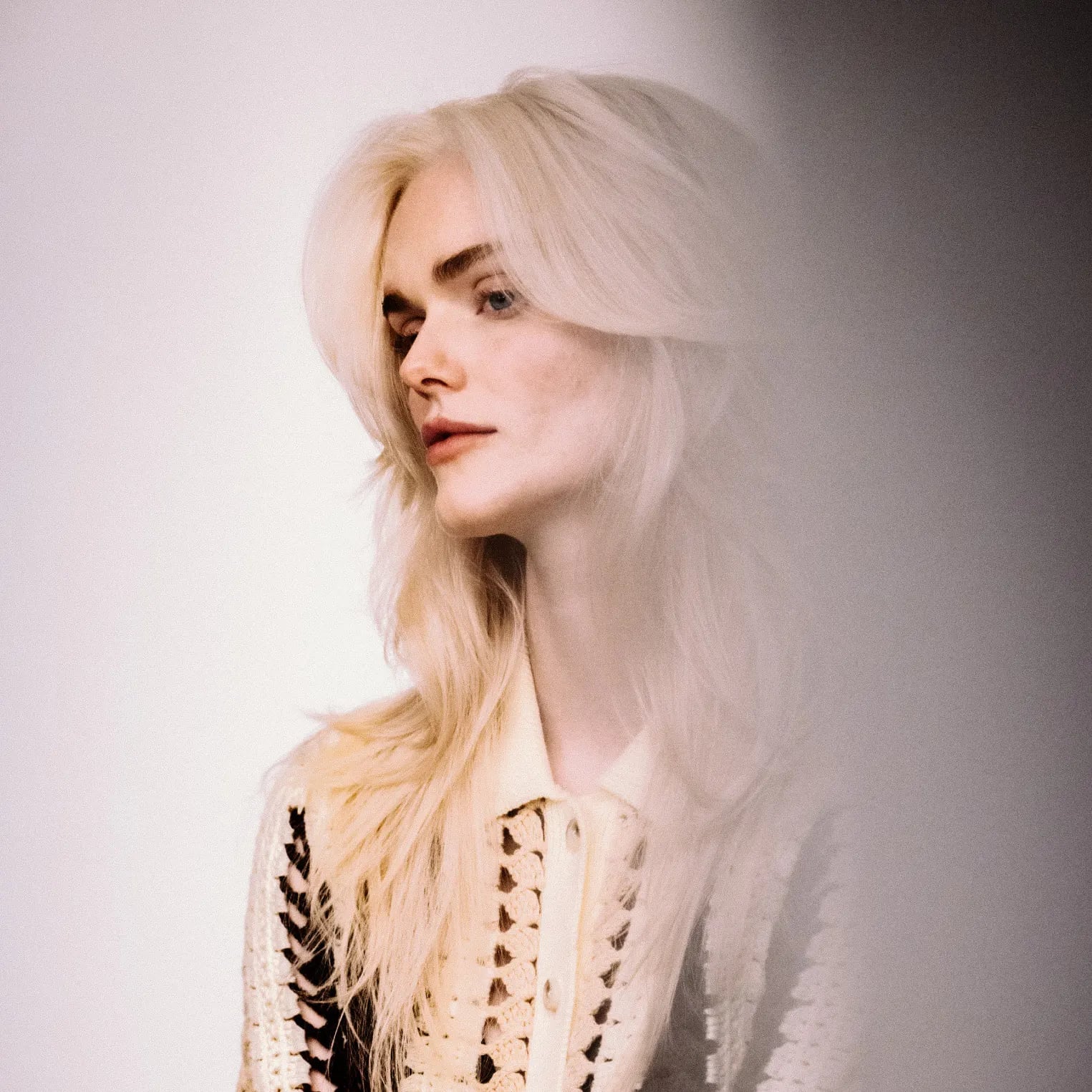 Mid-Back Platinum Blonde With Sweeping Layers — Butterfly Hair