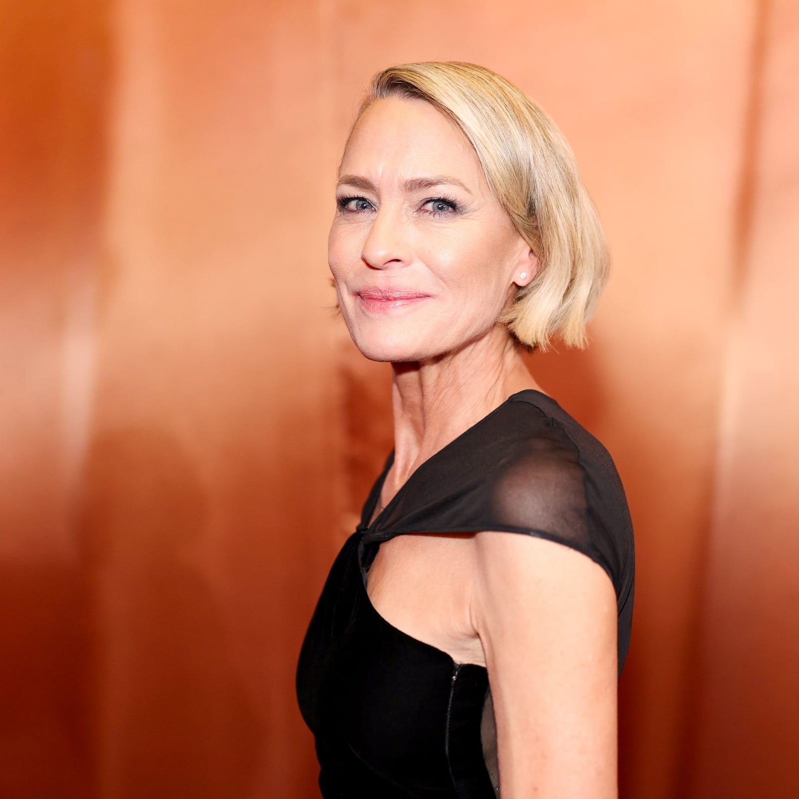 Sleek Ash Blonde Bob Ear Length — Hairstyles for Women Over 50