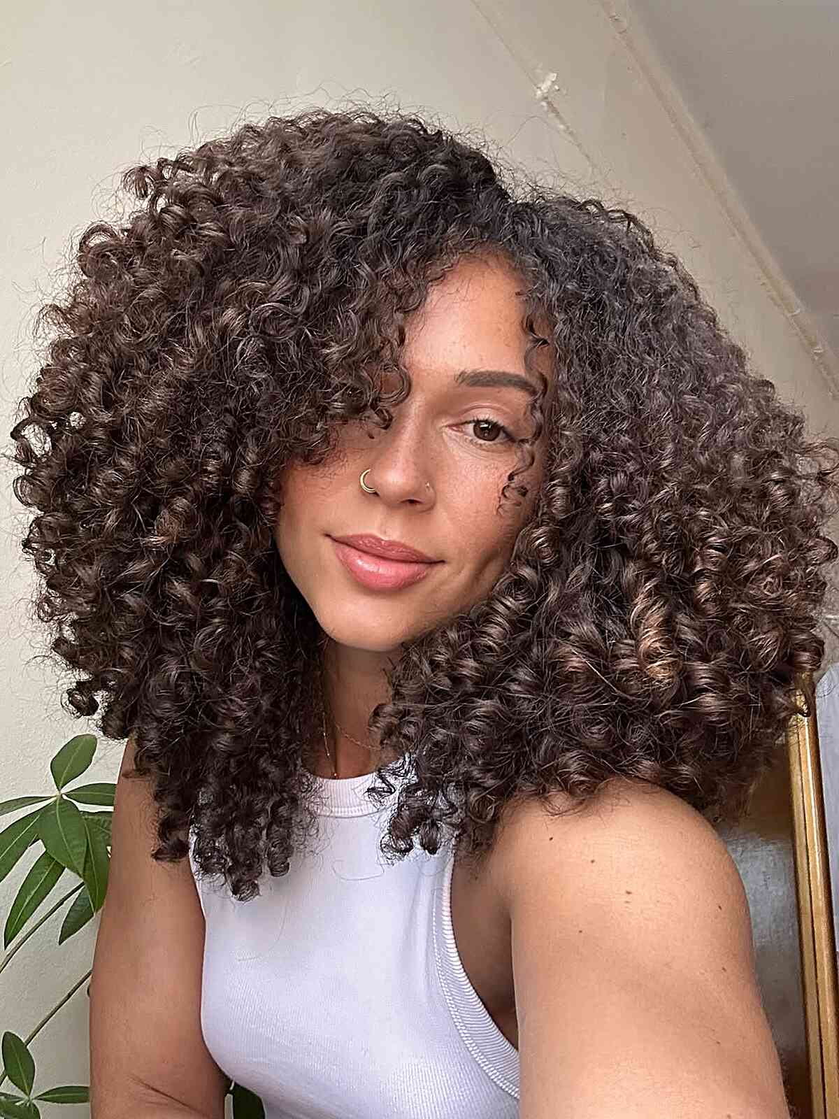 Shoulder Length With Full Curly Bangs and The Hair Appears Air-Dried — Easy 3c Hairstyles