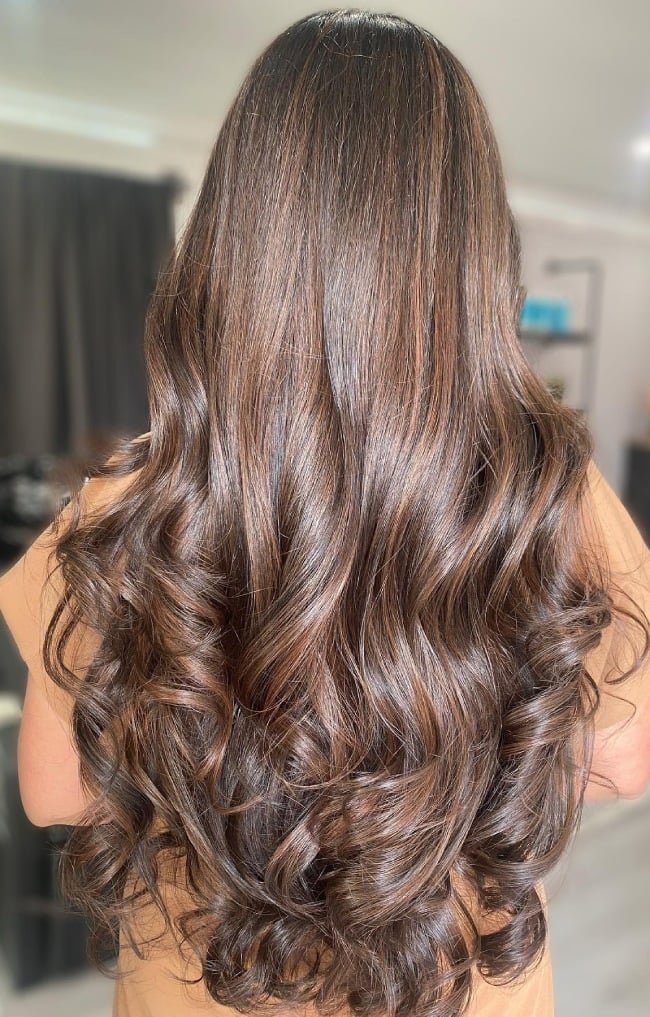 Long Chocolate Base With Sun-Kissed Balayage Curls — Trendy Chocolate Balayage